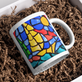 Stained Glass Sailboat at Sea Mug – Nautical Mosaic Ceramic Coffee Mug