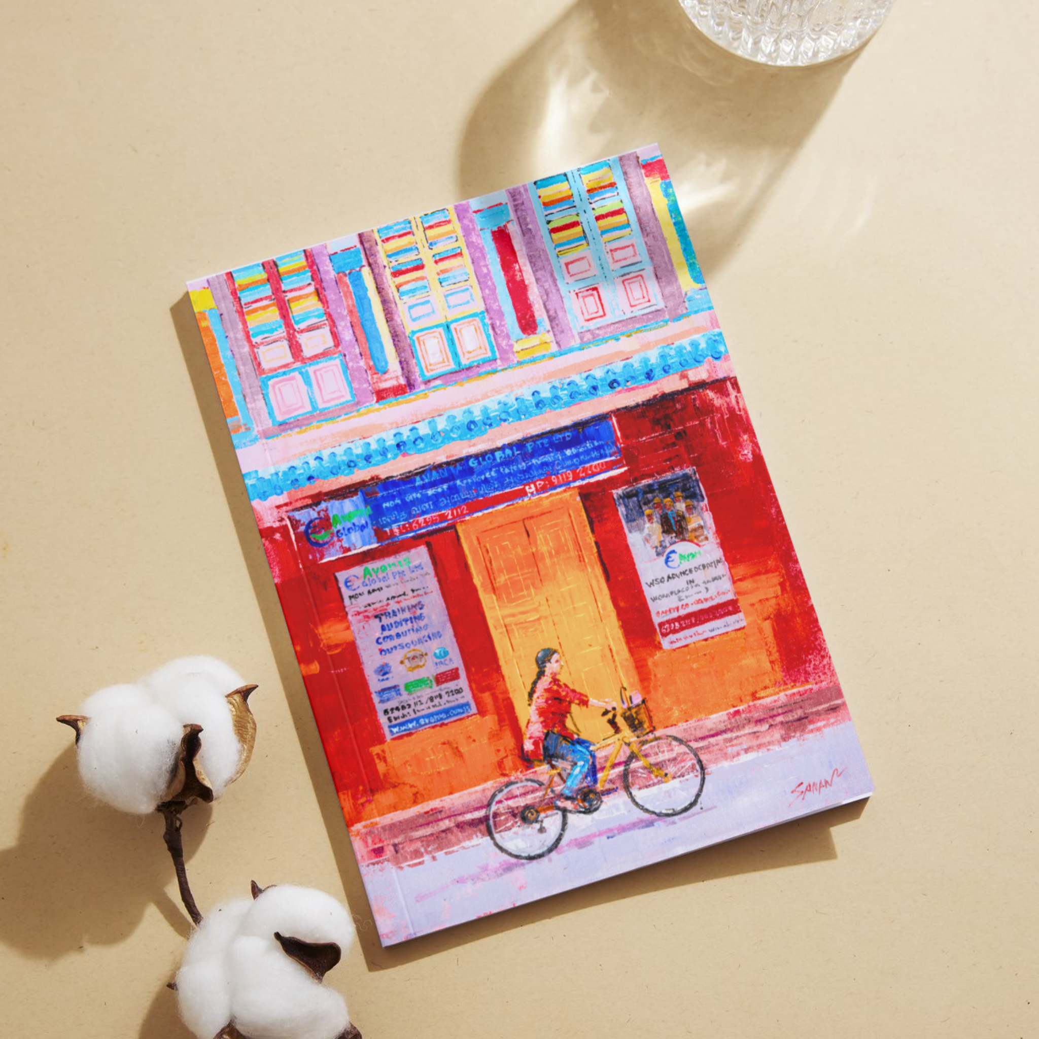 An Indian Lady Riding a Bicycle  through Little India Card - a curated painting